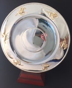 Silver plated plate with gold plated horse & jockey feature around the rim