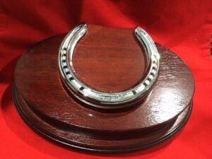 Chrome plated horse shoe trophy,